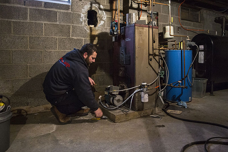 Air Group Installers Work on Ductless Mini-Split System Ductless Mini-Split System