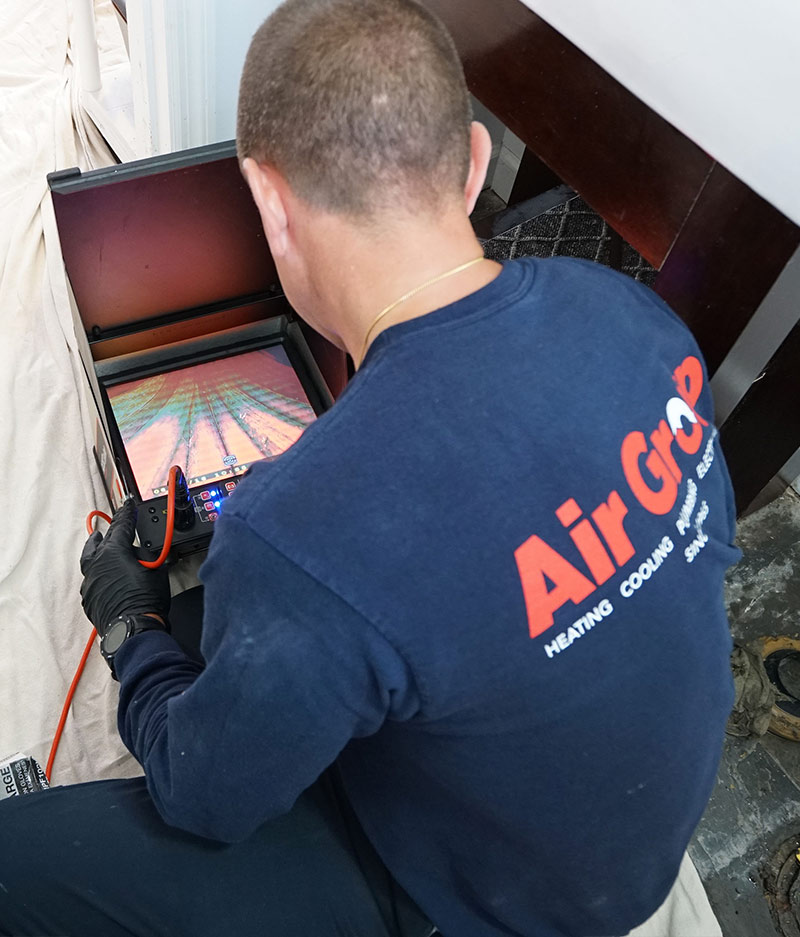 Air Group Plumber working on home Air Group Plumber
