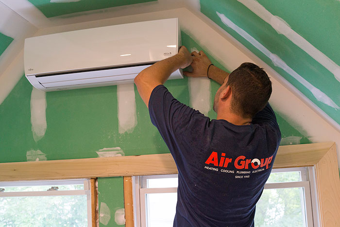Air Group Installers Work on Ductless Mini-Split System Ductless Mini-Split System