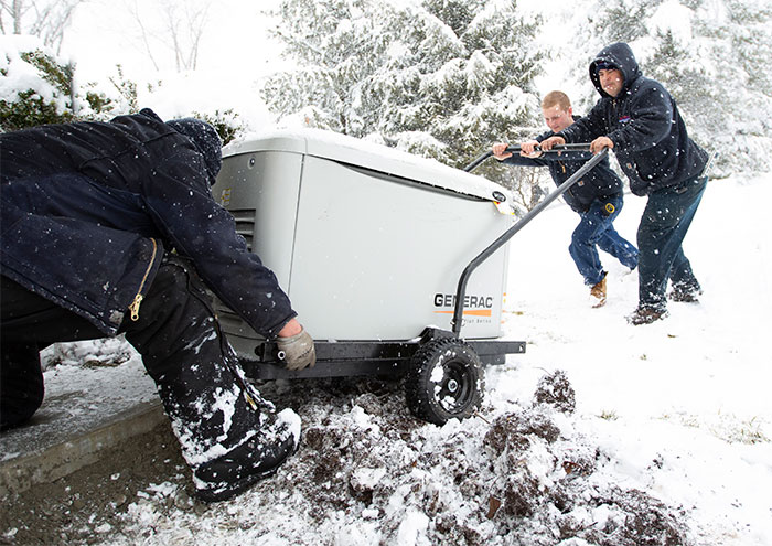 Air Group Installing Generator in Snow Storm Air Group Works in Any Weather For You
